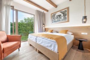 Postel nebo postele na pokoji v ubytování Hiša Marija House