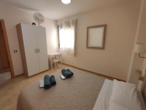 Posteľ alebo postele v izbe v ubytovaní Apartamento fuerte 1