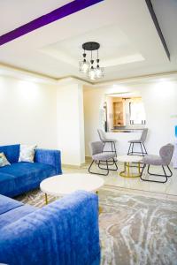 Χώρος καθιστικού στο Haven Suites Bnb - Runogone