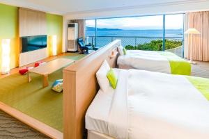 Postel nebo postele na pokoji v ubytování TAOYA Shima