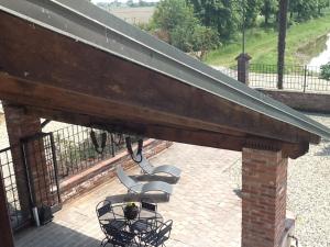Balkón nebo terasa v ubytování B&B Cascina Baraggione