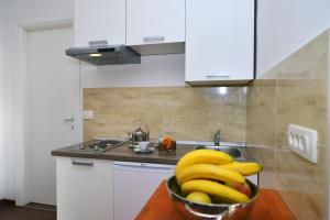 Kuchyň nebo kuchyňský kout v ubytování Grand Pool Apartment Ika-Opatija