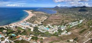 an aerial view of a beach and the ocean at Issos House in Agios Georgios