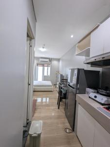 Kuchyň nebo kuchyňský kout v ubytování Miya's Crib Staycation B