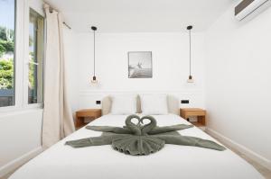 Postel nebo postele na pokoji v ubytování SERRES - Somptueux 2 pièces - Frontière Monaco - Vue Mer