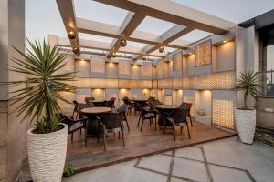 Treebo Riddhi Paradise - 15 mins from Airport休息區