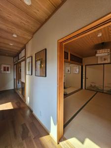 Postel nebo postele na pokoji v ubytování 五斗觀驛站 gotokan guest house