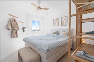 a bedroom with a bunk bed and a ladder at Secret View Riviera Del Sol in Sitio de Calahonda +18 photos