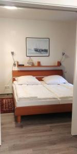 Ένα ή περισσότερα κρεβάτια σε δωμάτιο στο Haus Bellevue Wohnung 22 +2 φωτογραφίες