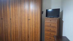 TV a/nebo společenská místnost v ubytování Casa Ausonia