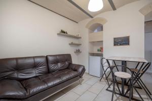 Posezení v ubytování Angolo Nascosto + 14 fotografií