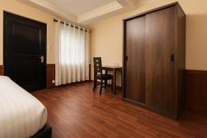 Voodi või voodid majutusasutuse Boudha Mandala Hotel toas