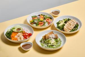 a group of bowls of food on a table at Days Inn by Wyndham Patong Beach in Patong Beach