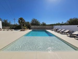 Basen w obiekcie INIBIZA VILLAS - Villa Bello lub w pobliżu