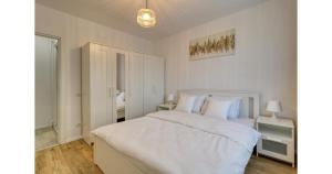 Postel nebo postele na pokoji v ubytování Zen Flat - 5 min Metrou