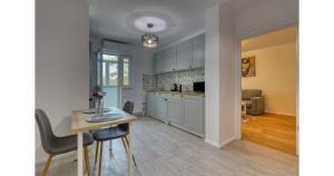 Kuchyň nebo kuchyňský kout v ubytování Zen Flat - 5 min Metrou