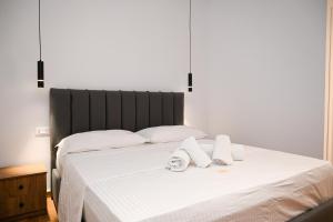 Postel nebo postele na pokoji v ubytování Hotel Vila AARON