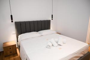 Postel nebo postele na pokoji v ubytování Hotel Vila AARON