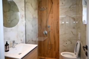Koupelna v ubytování Hotel Vila AARON