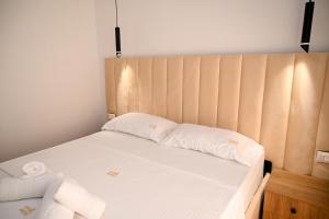 Postel nebo postele na pokoji v ubytování Hotel Vila AARON