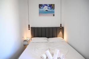 Postel nebo postele na pokoji v ubytování Hotel Vila AARON