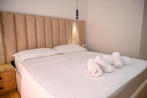 Postel nebo postele na pokoji v ubytování Hotel Vila AARON