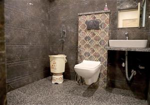 Koupelna v ubytování Hotel Aeron Paharganj + 27 fotografií