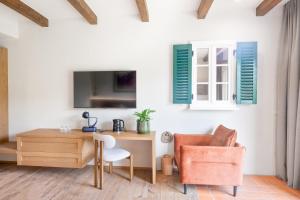 TV a/nebo společenská místnost v ubytování Hiša Marija House