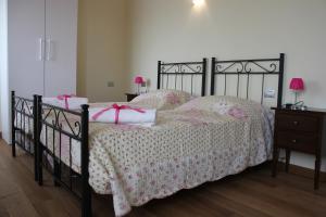 Кровать или кровати в номере Corte Ohana