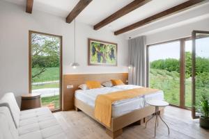 Postel nebo postele na pokoji v ubytování Hiša Marija House