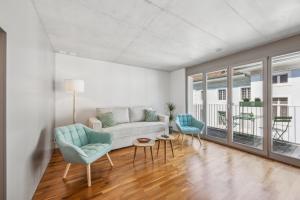 Posezení v ubytování Casa Milla, Apartment Langete - Moderne & zentrale Maisonette mit Balkon und Tiefgarage