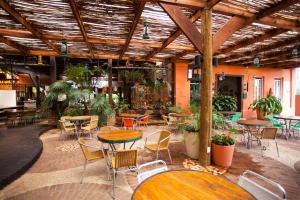 Um restaurante ou outro lugar para comer em Hotel de Lençois