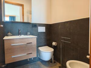 Koupelna v ubytování Hostdomus - La Piazzetta + 46 fotografií