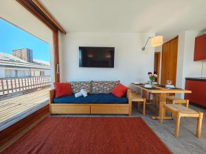 TV a/nebo společenská místnost v ubytování Hostdomus - La Piazzetta