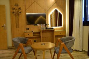 Kuchyň nebo kuchyňský kout v ubytování Neom Pyramids Valley Boutique hotel