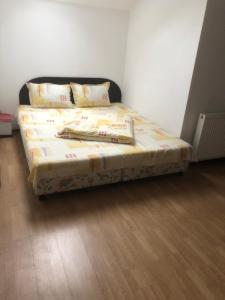 Postel nebo postele na pokoji v ubytování Pensiunea Residence