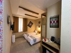 Hotel Byond Khiva客房内的一张或多张床位