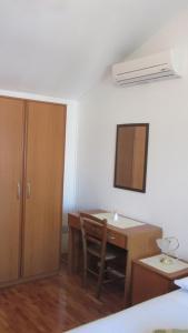 Postel nebo postele na pokoji v ubytování Apartment A&M