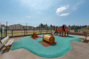 Ο χώρος παιχνιδιού για παιδιά στο T2 Meublé 38m² loggia 6 pers maxi