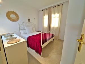 Postel nebo postele na pokoji v ubytování Apartamento en Aloha