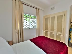 Postel nebo postele na pokoji v ubytování Apartamento en Aloha + 22 fotografií