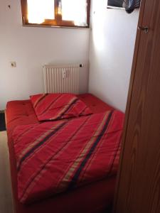 Ένα ή περισσότερα κρεβάτια σε δωμάτιο στο Panorama Seeblick