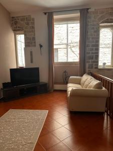 Ruang duduk di Casa Soma, mare e borgo