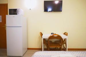 Kuchyň nebo kuchyňský kout v ubytování Residence Rosa