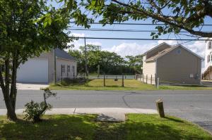 an intersection of a street with a church and a building at The Mane Escape in Chincoteague