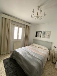Ένα ή περισσότερα κρεβάτια σε δωμάτιο στο Casa LaMedina