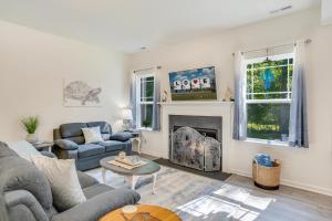 a living room with a couch and a fireplace at The Shore Shanty in Greenbackville