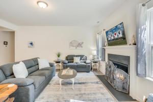 a living room with a couch and a fireplace at The Shore Shanty in Greenbackville
