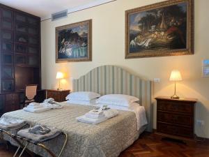 A bed or beds in a room at Casino di Pragatto