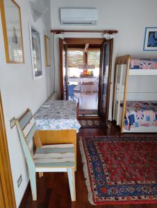 Postel nebo postele na pokoji v ubytování L'Onda